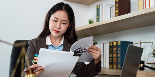 Attorney reviewing a UCC lien response in the ClearBizDebt attorney-backed MCA program