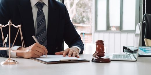 Attorney drafting a response to a merchant cash advance lawsuit in an attorney-backed MCA program