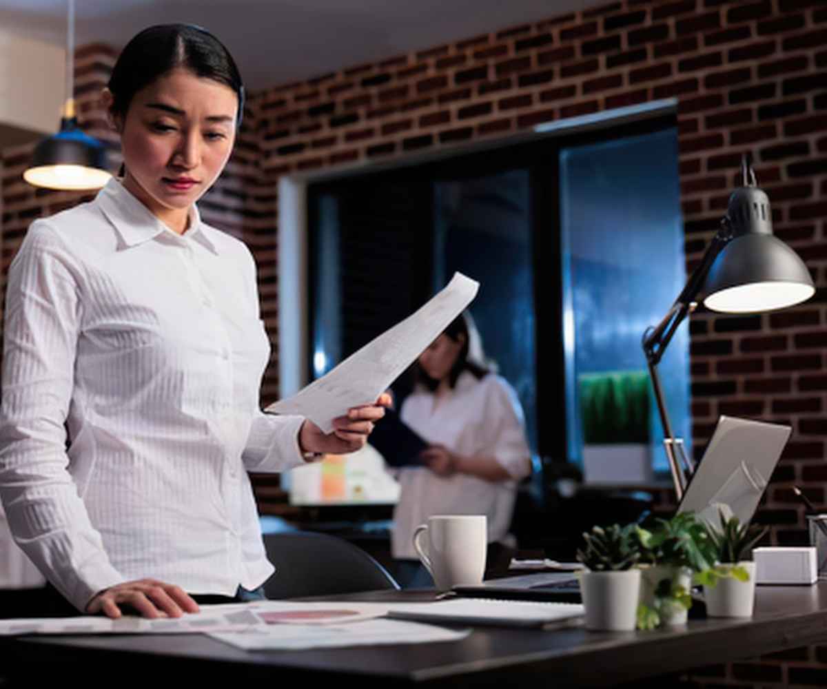 Business owner researching how to settle merchant cash advance debt