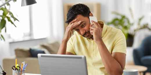 Business owner facing escalating merchant cash advance lender collection calls and texts