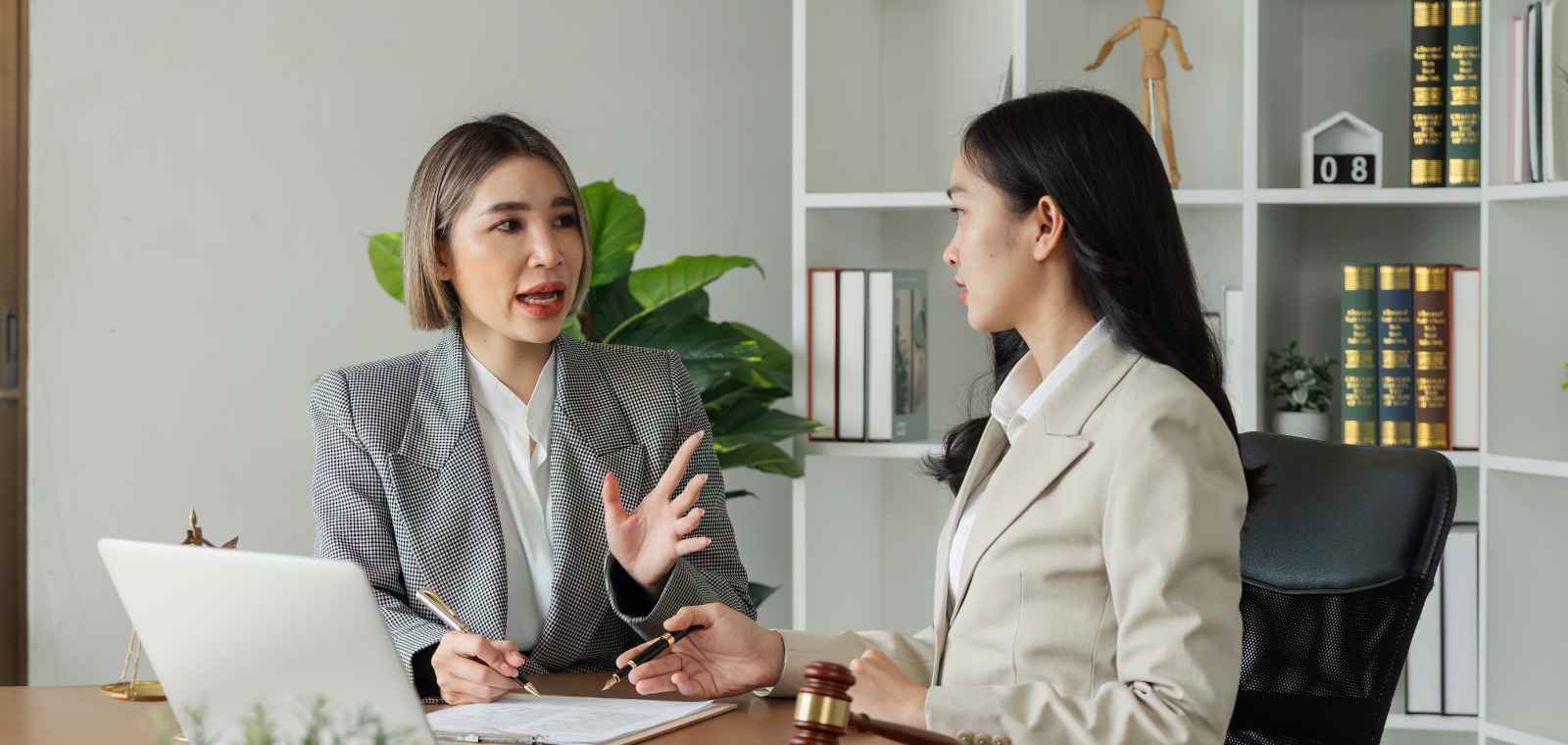 Business owner comparing MCA debt settlement companies with an advisor