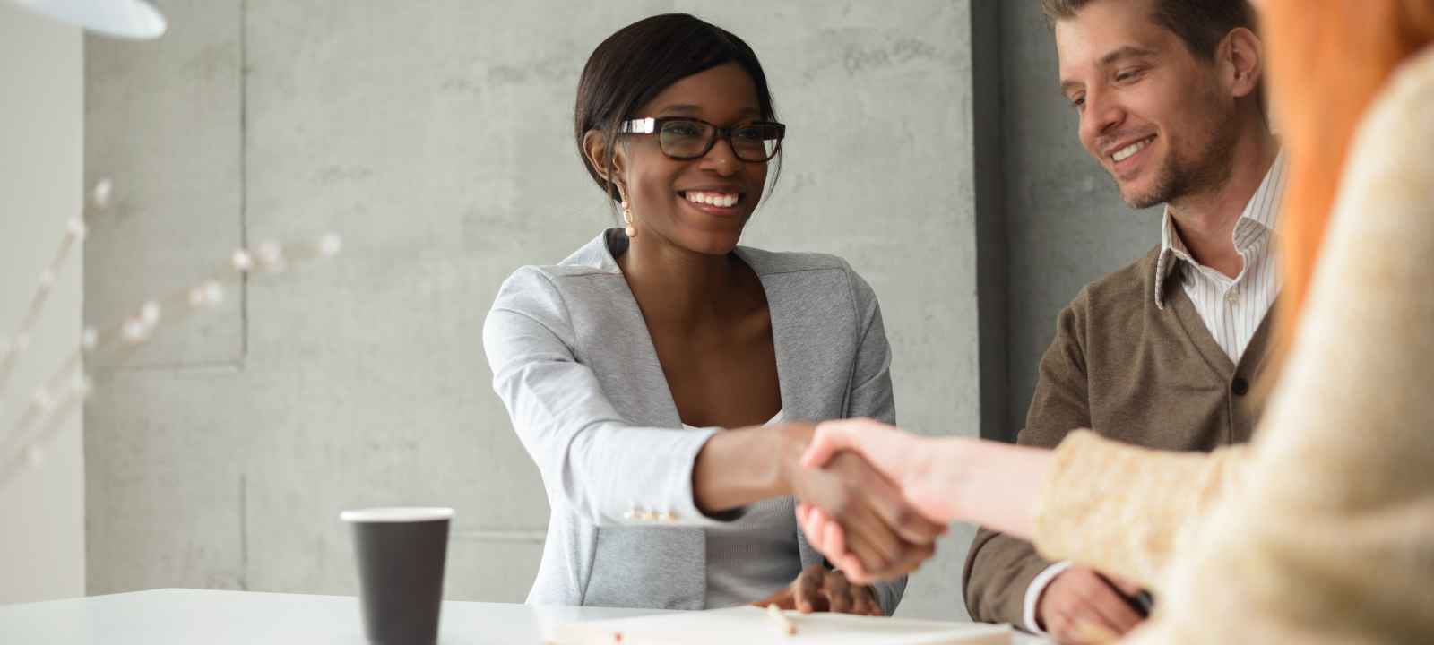 Business owner working through vetting questions with an advisor before signing an MCA debt relief agreement