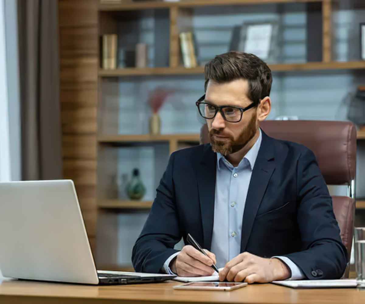 Business owner comparing Grant Phillips Law reviews against merchant cash advance program options