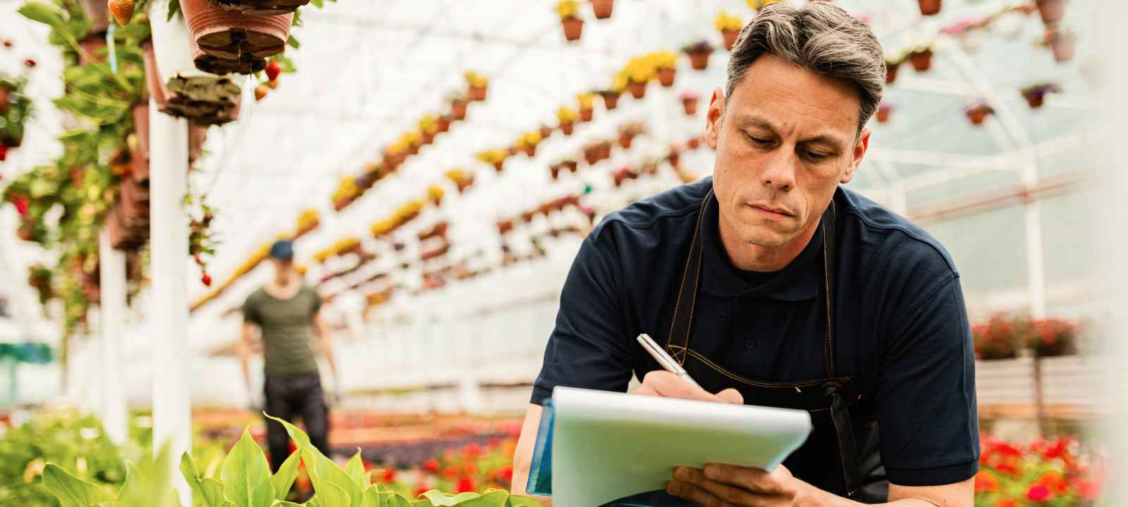 Business owner working through vetting questions with an advisor before signing a debt program